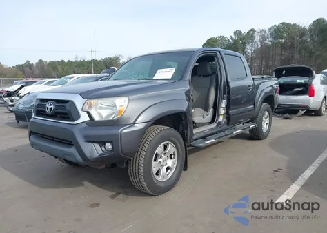 2014 Toyota Tacoma Base V6 z USA, uszkodzony, nr VIN 3TMLU4EN1EM162480